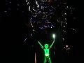 Man Burn - fireworks end, Man looks like he's holding something